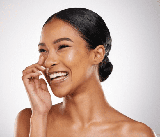 Smiling woman with a joyful expression.